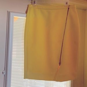 J. Crew yellow pencil skirt with adjustable front zipper split.